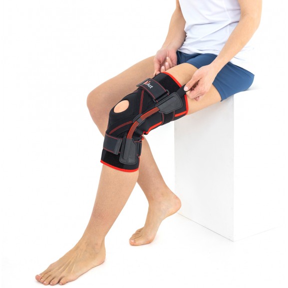 Ортез коленного сустава с эластичными шинами и перекрестными ремнями Reh4Mat Act Am-osk-z/s-a - фото №1